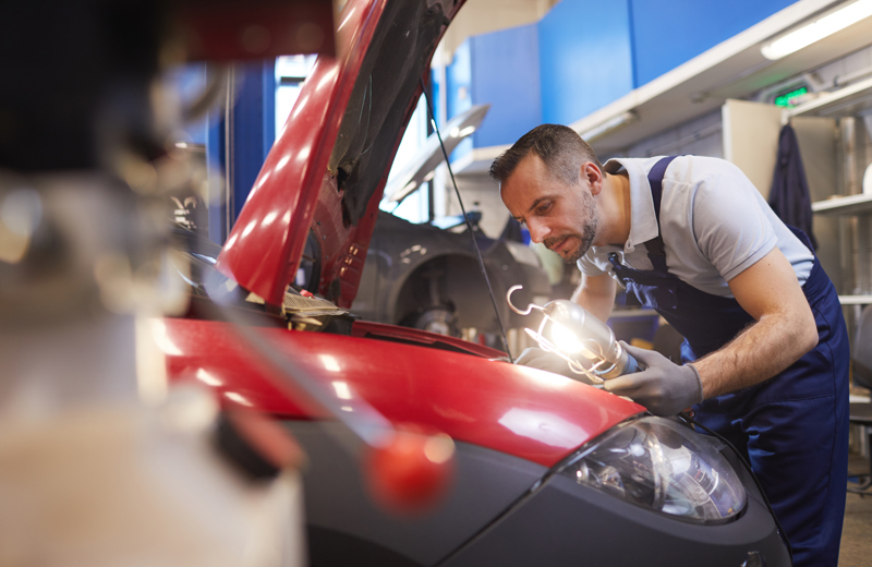 Mechanic Inspecting Car In Garage Workshop 2022 02 02 04 48 43 Utc